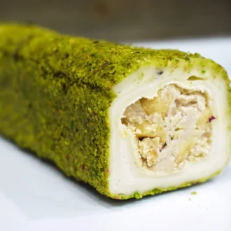 Hazelnut Butter and Hazelnut Pieces filled Turkish Delight covered with Marshmallow and Pistachio